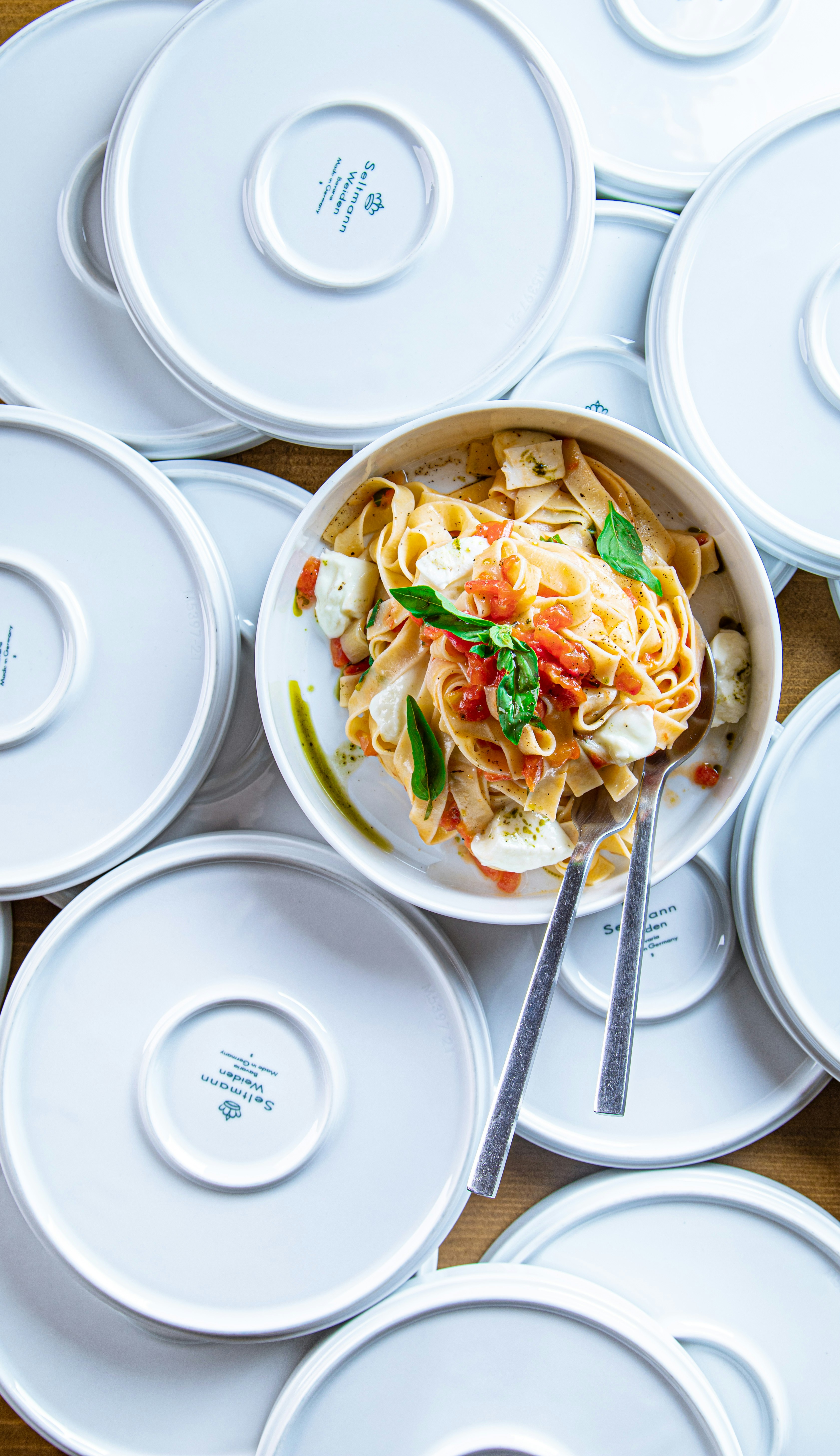 white ceramic bowl with chopsticks